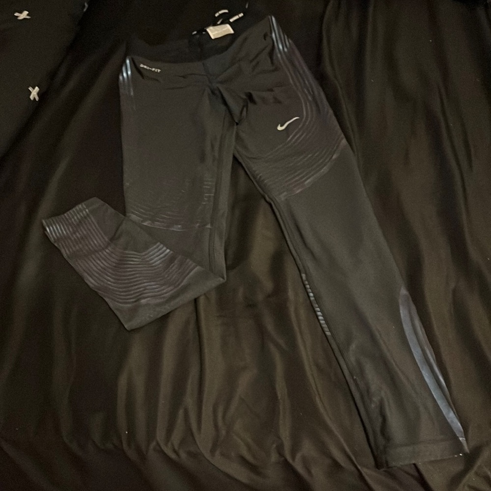 Size small various Nike running tights